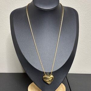 Money Swirl Wavy Polished Heart Slider Gold Tone Chain Necklace